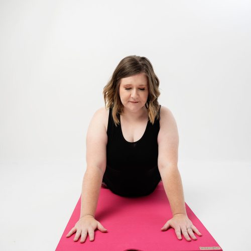 "Laura Mickler is a yoga teacher and owner of Sacred Steps Yoga Studio. She is a registered yoga teacher with a focus on Restorative Yoga & Yin Yoga. In 2023, Laura opened Sacred Steps Yoga Studio in Indiana to create a boutique yoga experience for slower-paced yoga. Yoga has also deepened her connection to the earth and all it can offer and teach us. She ends every class honoring the sky above, the Earth below and the peace within. Laura lives in Yorktown, Indiana with her husband Alex, their two boys Rowan and Milo and 2 pups, Teddy & Poppy."