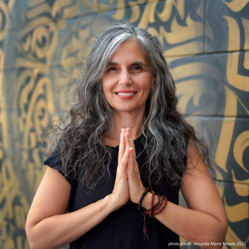"For yoga: Cheryl Chaffee (ERYT-500, YACEP) has been teaching yoga since 2005 and is one of the country’s top teachers/teacher trainers in Ashaya Yoga. Previously a Certified Anusara Yoga Teacher, she has studied intensively with Todd Norian, the founder of Ashaya Yoga, and is now a licensed Ashaya Yoga Teacher and Teacher Trainer. Cheryl has studied with Tantric Yoga philosophy scholars, Paul Muller Ortega, Douglas Brooks, and Bill Mahony. Cheryl loves the depth and intensity of Ashaya Yoga. She feels that the purpose of yoga is not to do the most difficult asanas, but is to go deeper into the understanding of the Self through the body, and connect to the Heart. Ashaya Yoga invites students to look at the places where yoga (and life) is challenging, and encourages everyone to connect to their own authenticity. Cheryl teaches authentically from her heart in order to help her students bring about their own transformation. For kirtan: Bhakti Bliss Kirtan has a unique style which transports you to a deep devotional place in your heart, while also inspiring you to get up and dance and express your joy and bliss for life! Kirtan is the joyful expression of Bhakti Yoga, the yoga of devotion, and it’s one of the easiest ways to open your heart and feel your love connection to all of everything! Cheryl Chaffee is the group's founder- she has been leading kirtan at yoga studios, churches, temples, community centers and sacred spaces around the world since 2009, including festivals such as the Rasa Lila Fest, the Tampa Indian Music Festival, Aqueous Festival, Wonderfruit, Lovelight Festivals, Shakti Rising Goddess Festival, Sangha Fest, and Zen Awakening Festival. Cheryl’s angelic voice and grounded energy is personal, inspiring, and transformative. Each band member brings their unique artistry to the group, creating a multi-dimensional sound experience. The combined vibrations lift you up and help you attune to your own inner resonance, as well as connect with the frequencies of the Divine. Audience participation is encouraged! Sing and dance your heart’s blissful freedom!