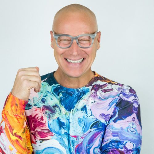 "Jona Ellis (they/them) 'Your body isn’t broken—it’s just alive, and sometimes that feels like a lot.' Jona Ellis is a therapeutic yoga educator, breath-work facilitator, and anatomy enthusiast specializing in aging bodies and people navigating illness or injury. Their teaching blends evidence-based movement, nervous system support, and accessible practice design with a deep respect for the realities of aging, illness, and recovery. With more than 20,000 teaching hours, 1,000 hours of anatomy training, and advanced study in aging at Duke University, Jona has partnered with organizations including NIKE, Blue Cross Blue Shield, and Tivity Health. Their primary teacher is Jason Crandell, whose mentorship continues to inform Jona’s approach to clarity, sequencing, and sustainable practice. Before teaching full-time, Jona spent two decades at NIKE developing mindfulness and wellness programs for employees—long before “wellness” became a corporate trend. Their work invites students to move with curiosity, self-respect, and humor, recognizing that practice isn’t about perfection—it’s about returning, again and again, to what’s still possible."