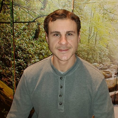 Jacob Gilbert is a Licensed Massage Therapist offering therapeutic bodywork and holistic wellness support through Collective Wellness & Spa (CWS) and AHHA – Awareness of Healing for Humans & Animals. Jacob’s work blends deep tissue techniques, intuitive touch, and nervous-system-aware care, supporting pain relief, mobility, and overall balance. He works collaboratively with clients, adapting each session to their unique needs—whether they are managing chronic tension, recovering from physical strain, or seeking deeper body awareness. In addition to massage, Jacob offers wellness consults focused on natural and holistic lifestyle support, drawing from extensive knowledge of plant-based traditions, nature-centered practices, and integrative wellness approaches. These consults are educational and supportive in nature, helping clients explore options for self-care, resilience, and alignment with their bodies and environment. Known for his calm, grounded presence, Jacob creates a space where clients feel safe, heard, and supported. Through his work at CWS and AHHA, he collaborates closely with a diverse team of practitioners, offering massage and holistic guidance as part of a whole-person approach to wellness.